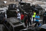 Two bombs at Baghdad car dealerships