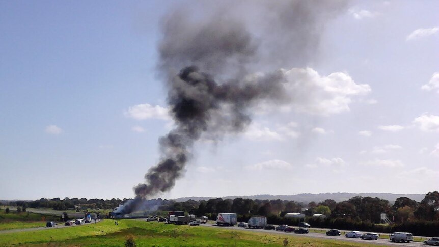 Smoke rises from a truck fire on the Pakenham Bypass.