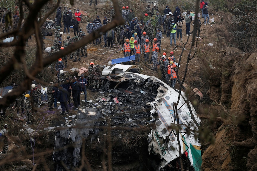 The crash site of a Yeti Airlines passenger plane in Pokhara, Nepal.