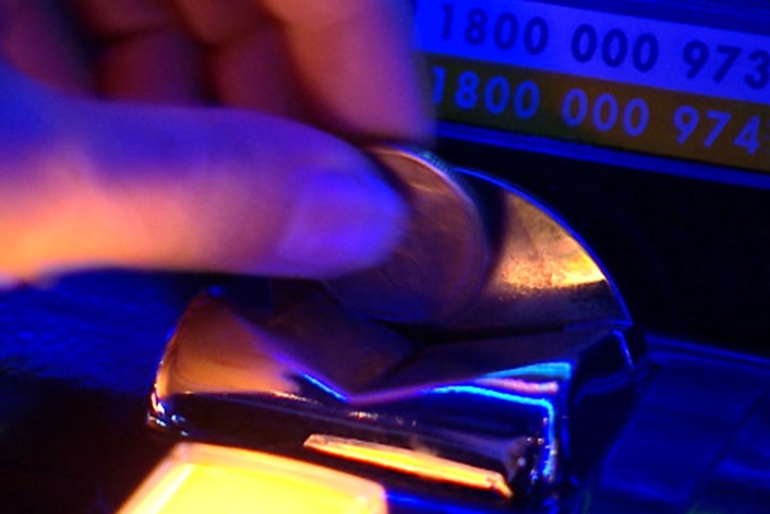 Close up of playing pokie machines