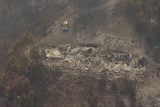 The bushfires in Tasmania have so far claimed about 20 houses.