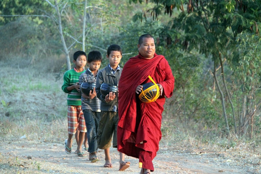 Abbott Venerable Sattka Pala leads three boys at the Shwe Sikone Monastery in western Burma.
