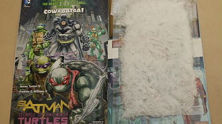 A comic book beside a packet of methylamphetamine