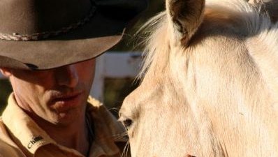 Carlos Tabernaberri whispers to a horse