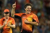 Hot form ... Brad Hogg celebrates a wicket against the Strikers (Paul Kane: Getty Images)
