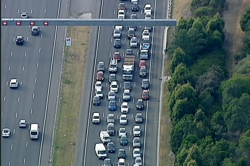 Lanes of traffic backed up on the Monash Freeway, pictured from above.