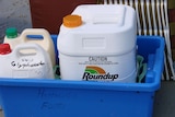 containers of herbicides