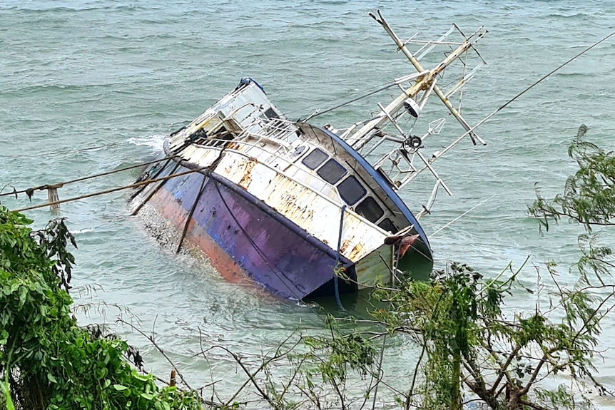 A boat that sank after Cyclone Judy made landfall in Port Vila, Vanuatu.