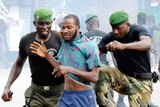 Guinean man arrested amid bloody protests