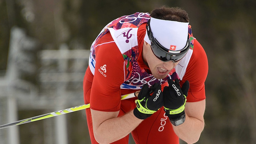 Dario Cologna wins gold in the cross country
