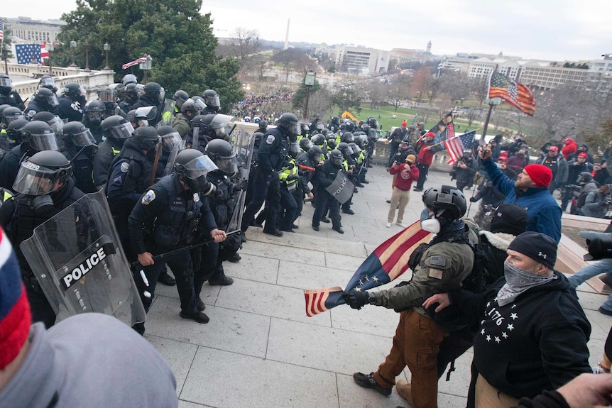 US Capitol Police push back demonstrators who were trying to enter the US Capitol.