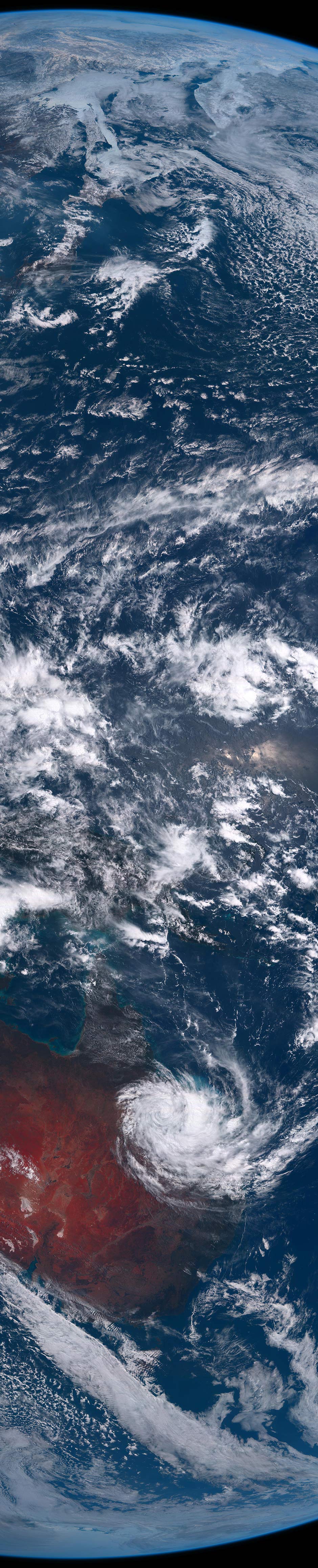 A view of the Earth from space captures ex-tropical cyclone Debbie over Queensland.