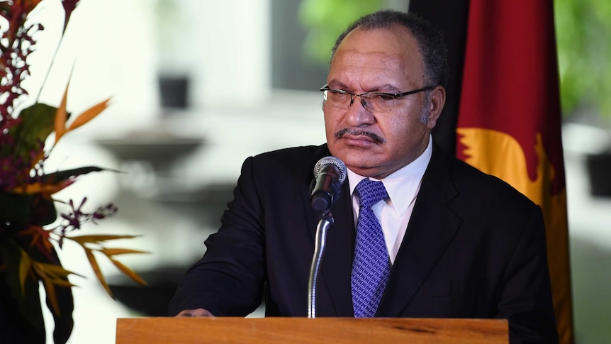 Papua New Guinean Prime Minister Peter O'Neill speaks to the media during a joint press conference