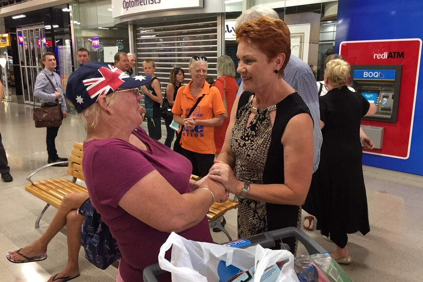 Pauline Hanson speaks to a female voter at a Mandurah shopping centre.