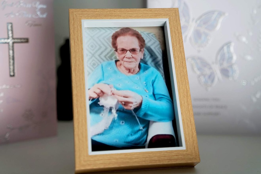 A framed photo of Alice Bacon.