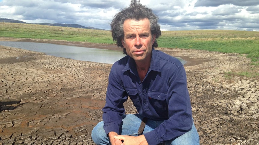Ross farmer Julian Von Bibra at his near-empty dam.