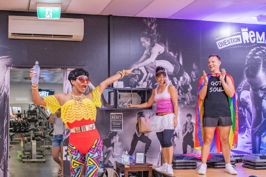 Drag queen leading a spin class