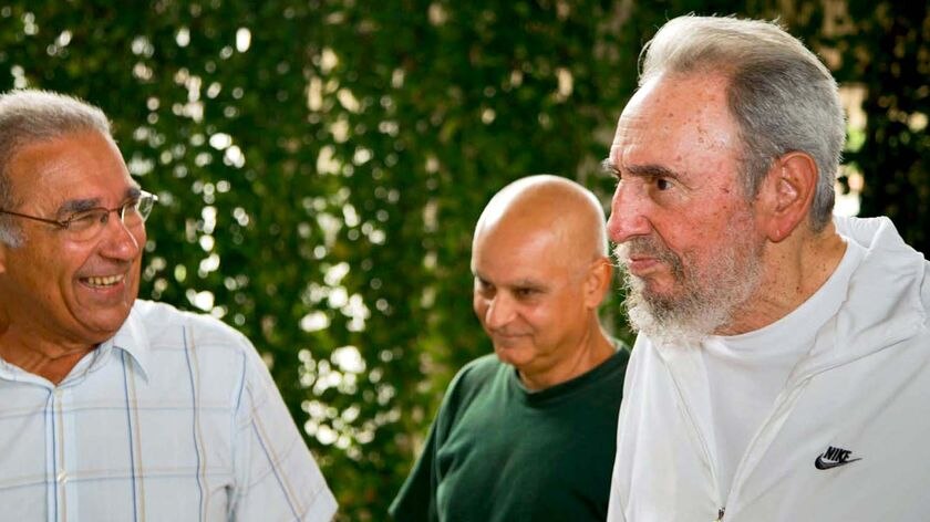 Cuban leader Fidel Castro, right, visits the National Centre of Scientific Investigations (CNIC)