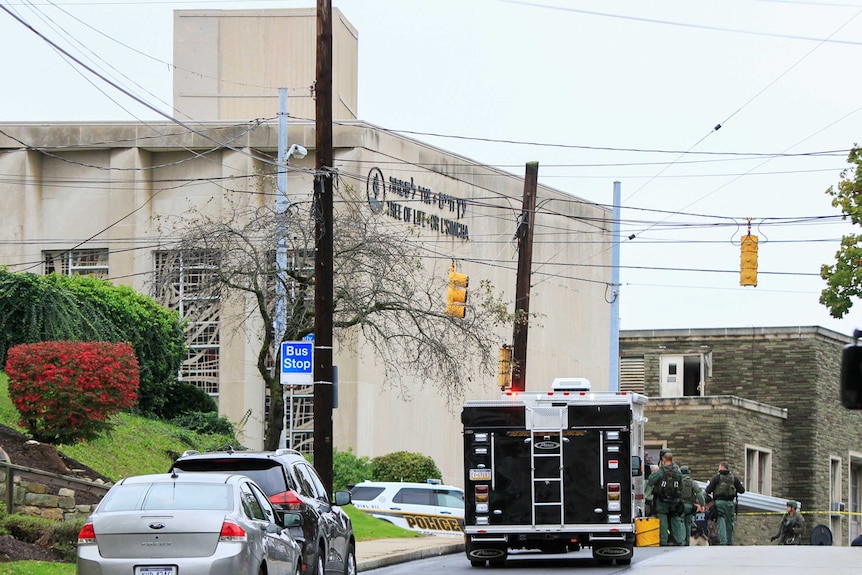 police stand outside a building