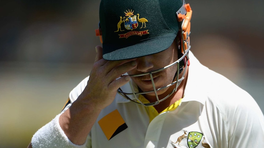 Australia's David Warner leaves the field