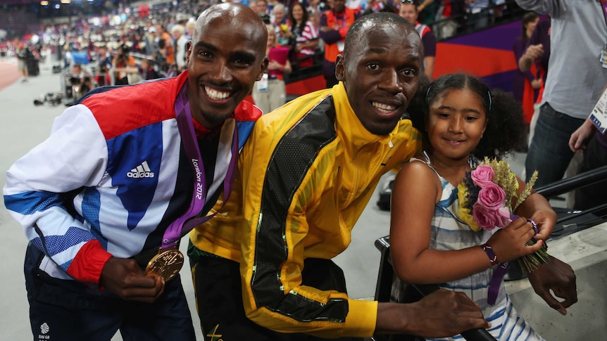 British gold medallist Mo Farah with daughter Rihanna and Usain Bolt at London Olympics in 2012.