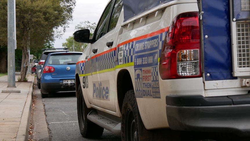 A police car parked on Todd St.