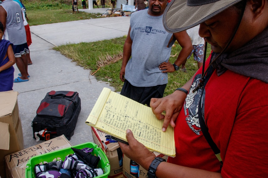 Officials check housing status on Ulithi