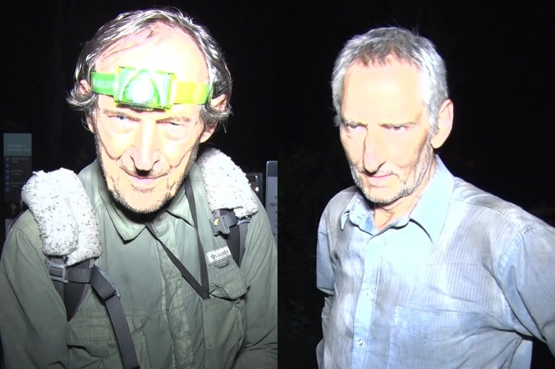 Two men looking tired and dirty after being out in the bush for days