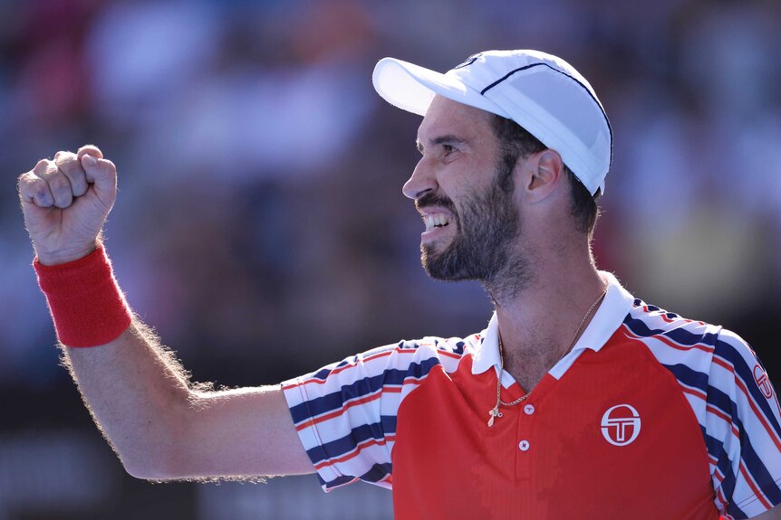 Mikhail Kukushkin of Kazakhstan celebrates after winning a point in his semi final match against Leonardo Mayer of Argentina