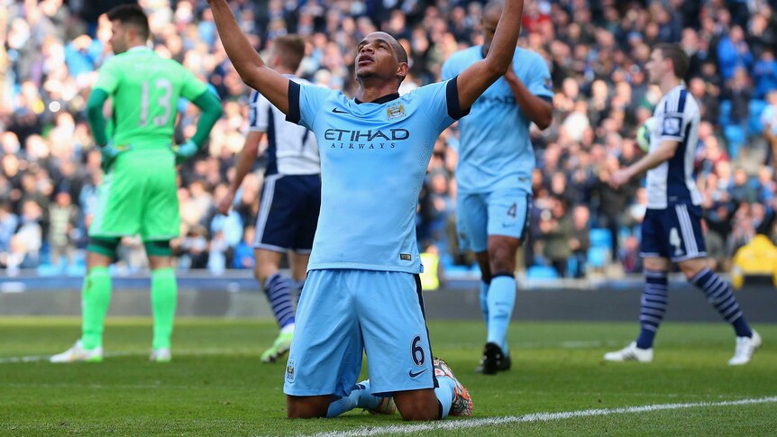 Fernando celebrates goal for Man City