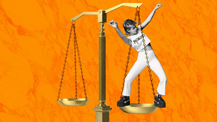 An image of Robyn standing on scales