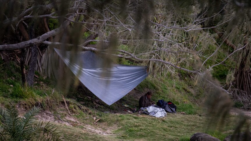 A man sleeping rough in Byron Bay.