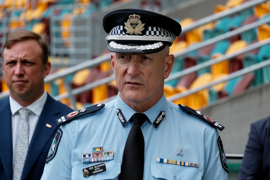 Queensland  Deputy Police Commissioner Steve Gollschewski speaks at a media conference