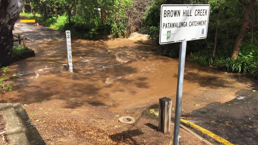 Water running over the road in the Brown Hill Creek catchment