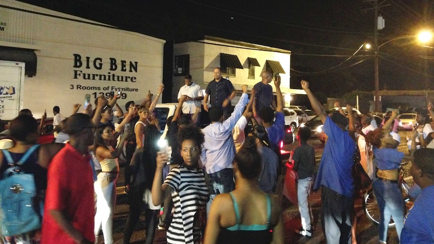 People protest after the Baton Rouge shooting