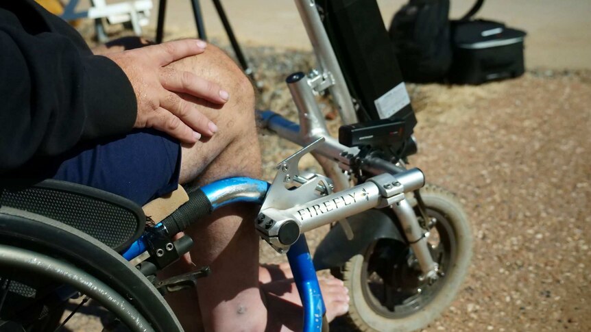 This Firefly device attaches to manual wheelchairs and enables them to travel 25km/h