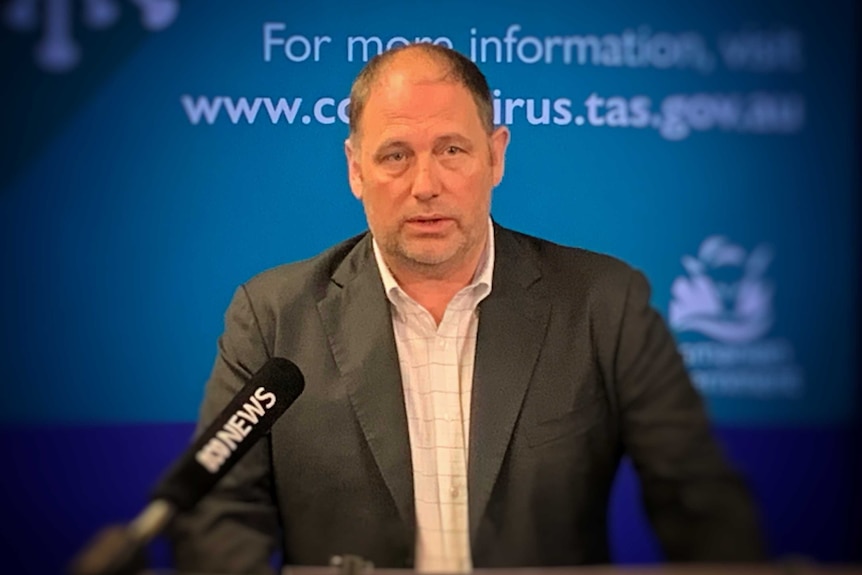 Professor Tony Lawler at a lectern.