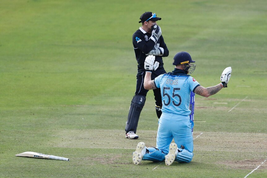 Ben Stokes holds up his hands in apology after deflecting the ball to the boundary