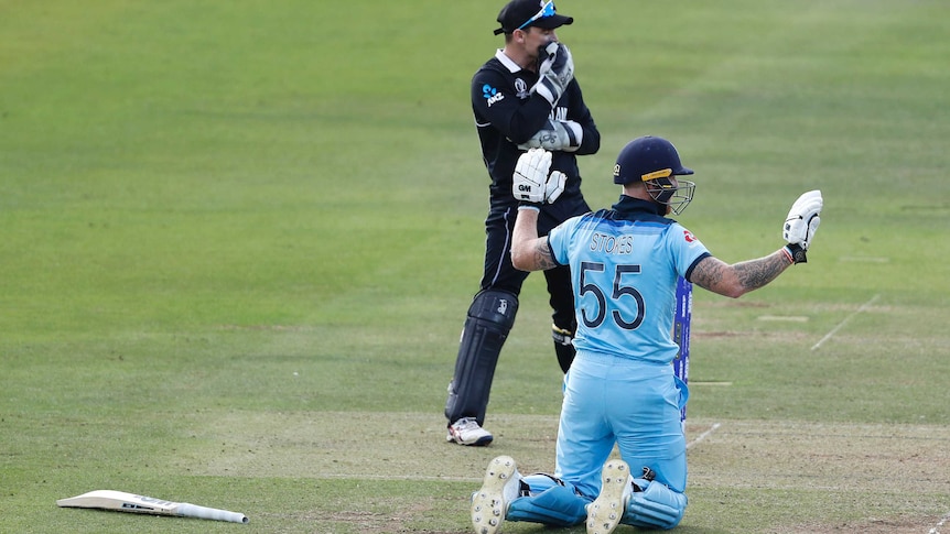 Ben Stokes holds up his hands in apology after deflecting the ball to the boundary