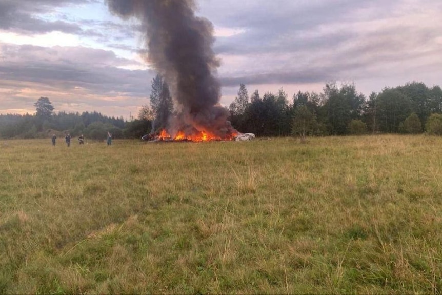 Smoke arises from the site of a jet crash near Moscow.