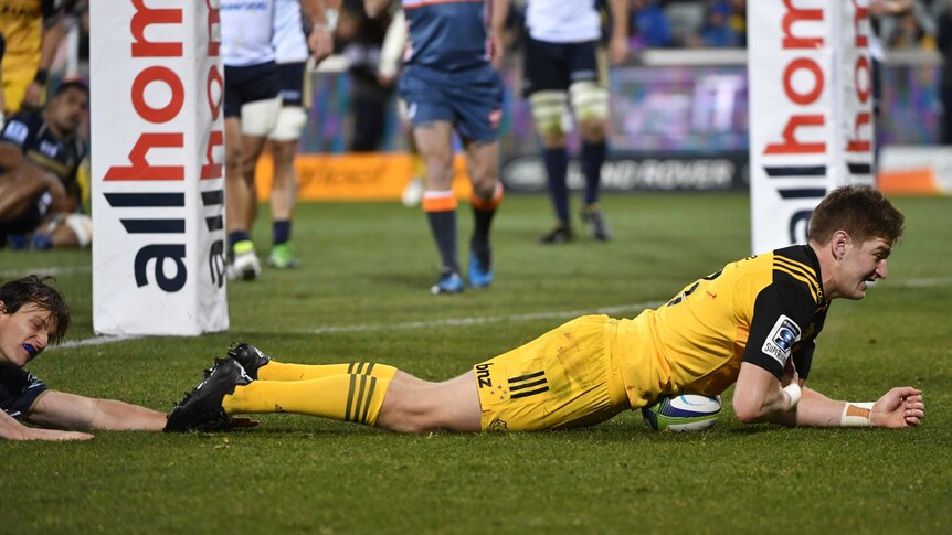 Hurricanes' Jordie Barrett scores a try during the Super Rugby quarterfinal against the Brumbies.