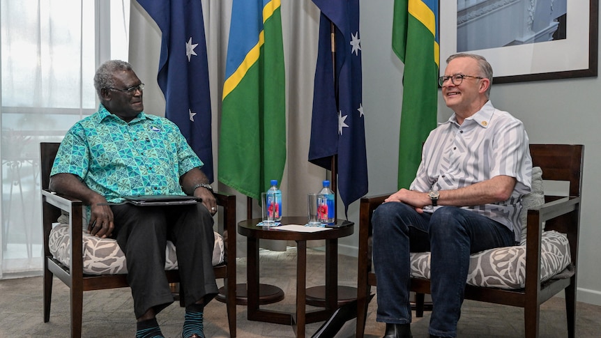 Prime Minister Anthony Albanese sitting with Prime Minister Manasseh Sogavare.