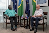 Prime Minister Anthony Albanese sitting with Prime Minister Manasseh Sogavare.