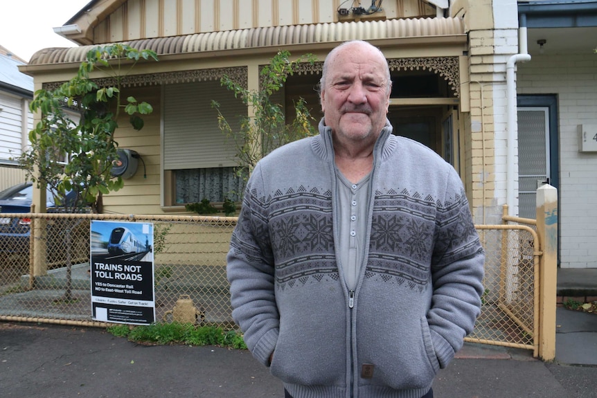 Keith Fitzgerald standing outside his house on Bendigo St Collingwood.