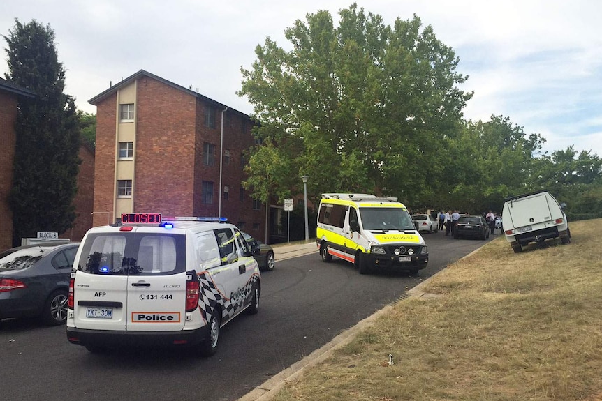 An ambulance leaves Stuart Flats in Canberra.