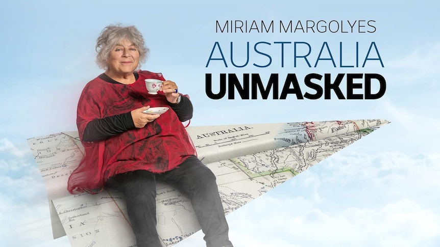 Miriam Margolyes sitting on an enlarged paper plan made from a map of Australia, with a teacup and saucer in hand, in the sky