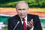 Russian President Vladimir Putin gestures as he addresses at the Eastern Economic Forum