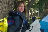 Lynne Hargreaves chained to a tree