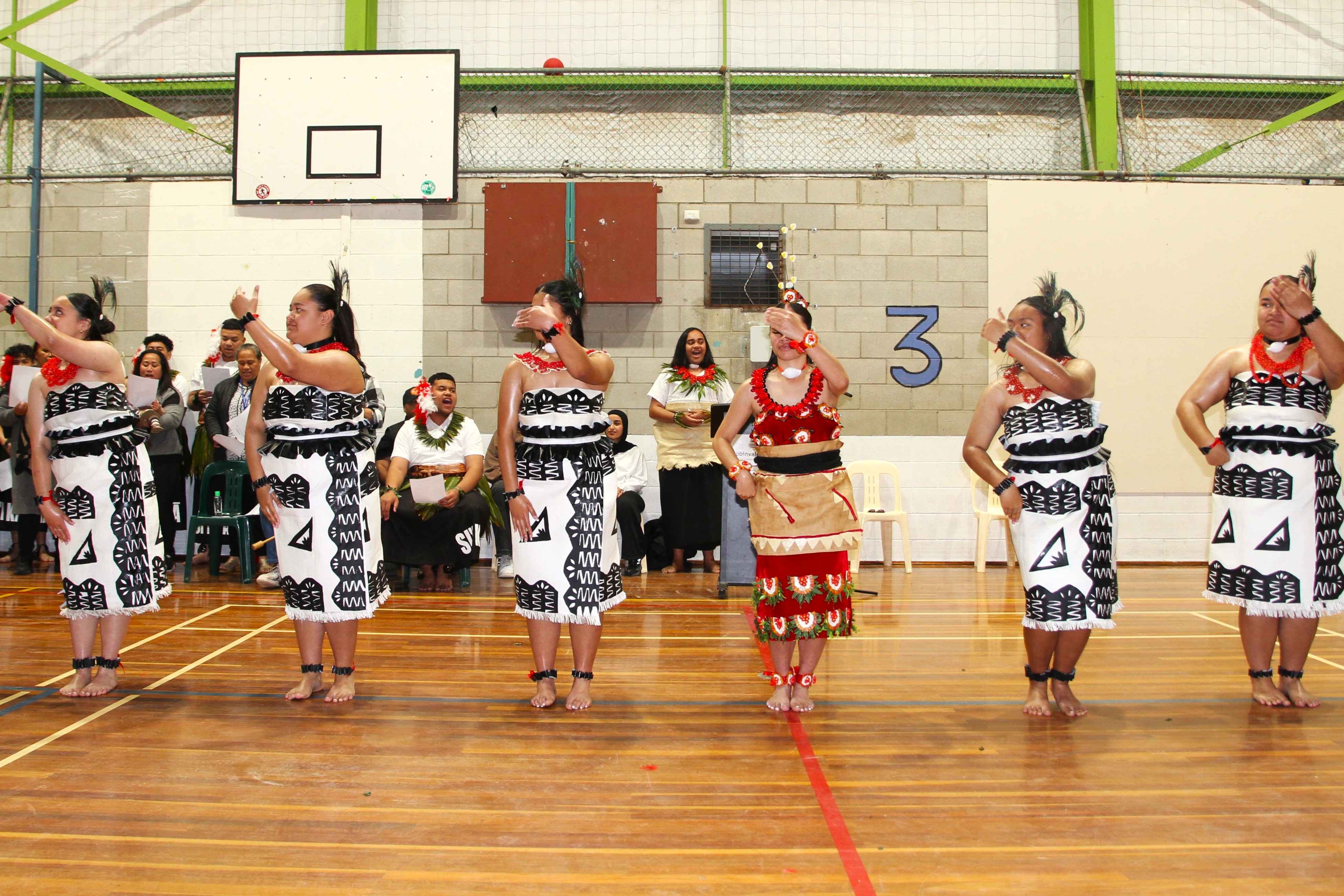 Six girls dance for Robinvale College students as part of the Si'i Kae Hā group.