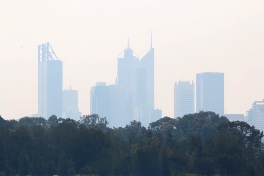 Perth's skyscrapers blanketed in a smoky haze.